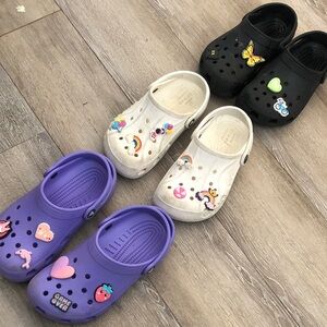 3 pairs crocs with croc charms size 2-3